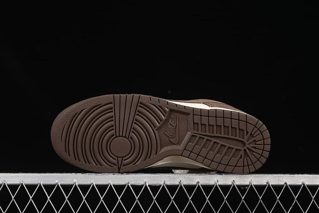 Underside view showing the brown patterned outsoles
