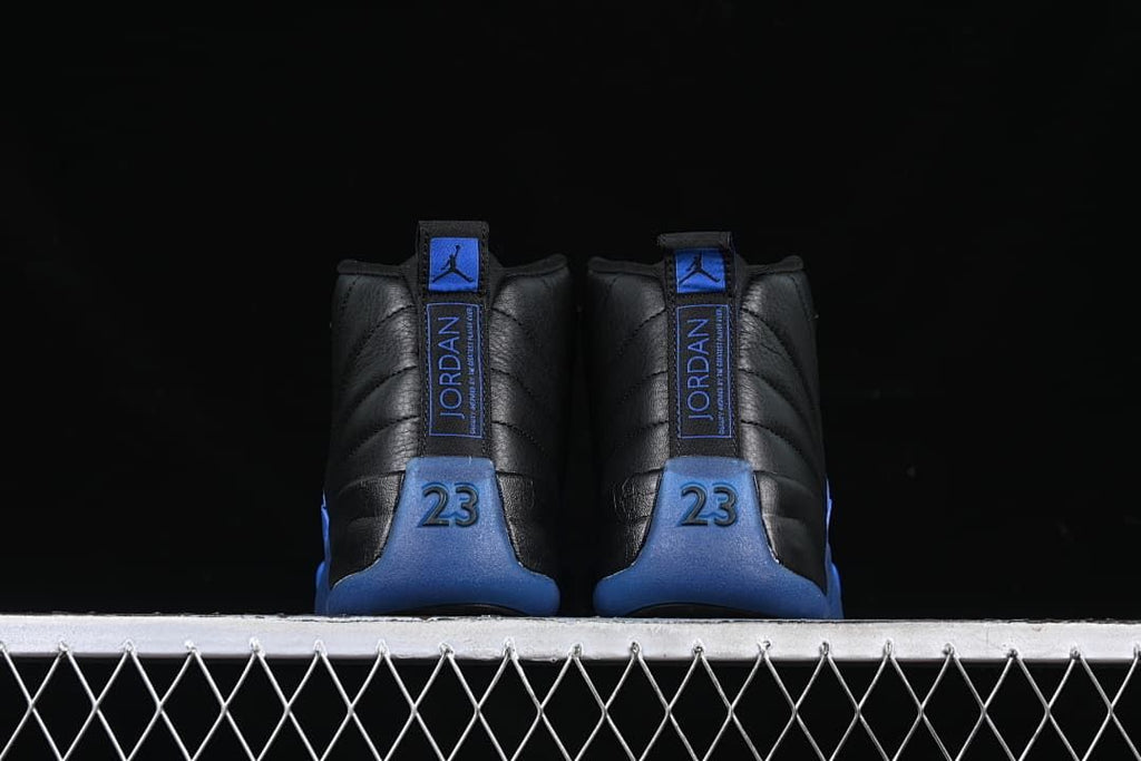 Rear view of the pair showing blue heel tabs and number 23 details