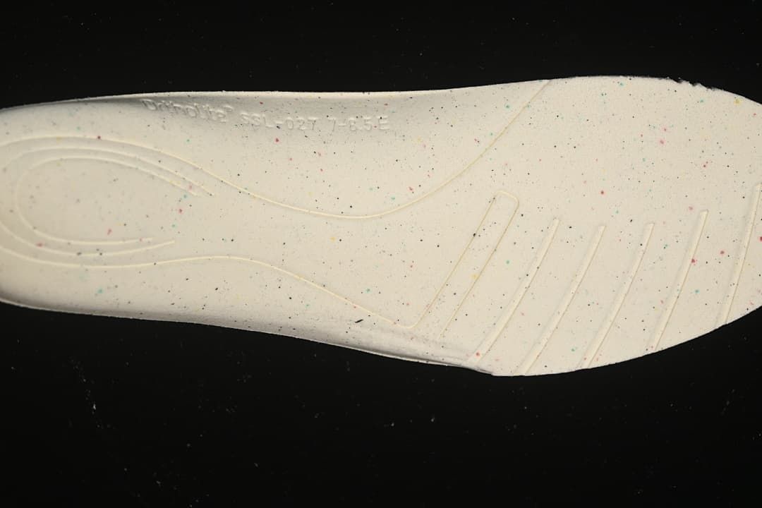 Close-up of the light-colored shoe insert