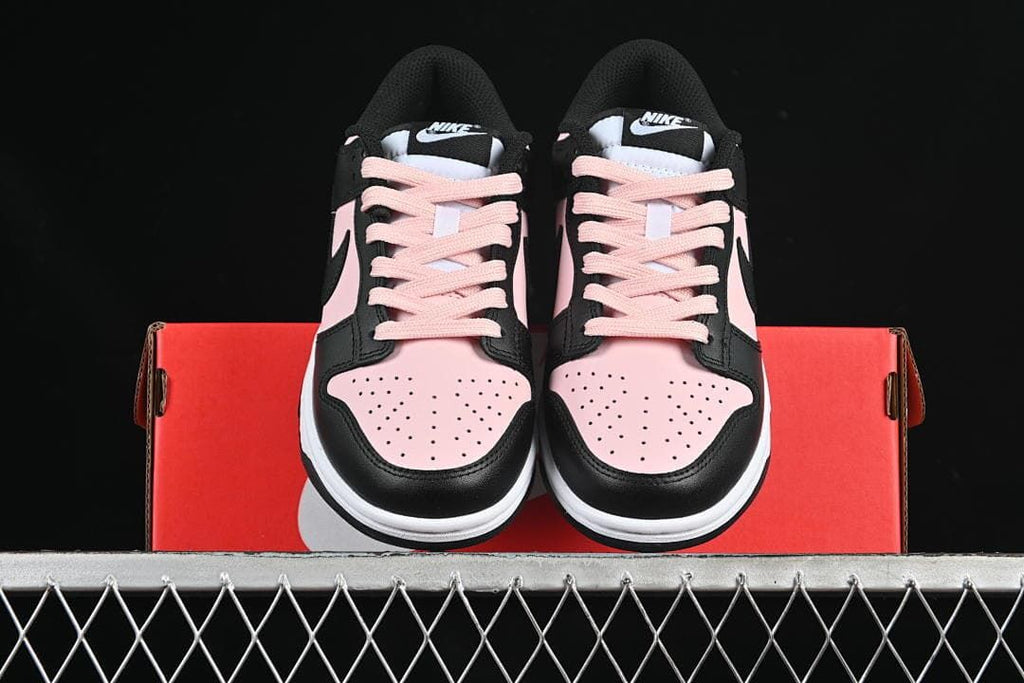 Front view of the pair with pink perforated toe panels and matching laces