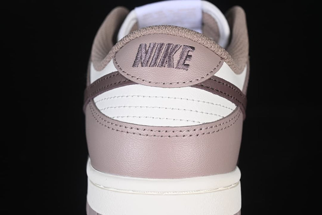 Rear view showing the heel panel, stitching, and Nike embroidery.