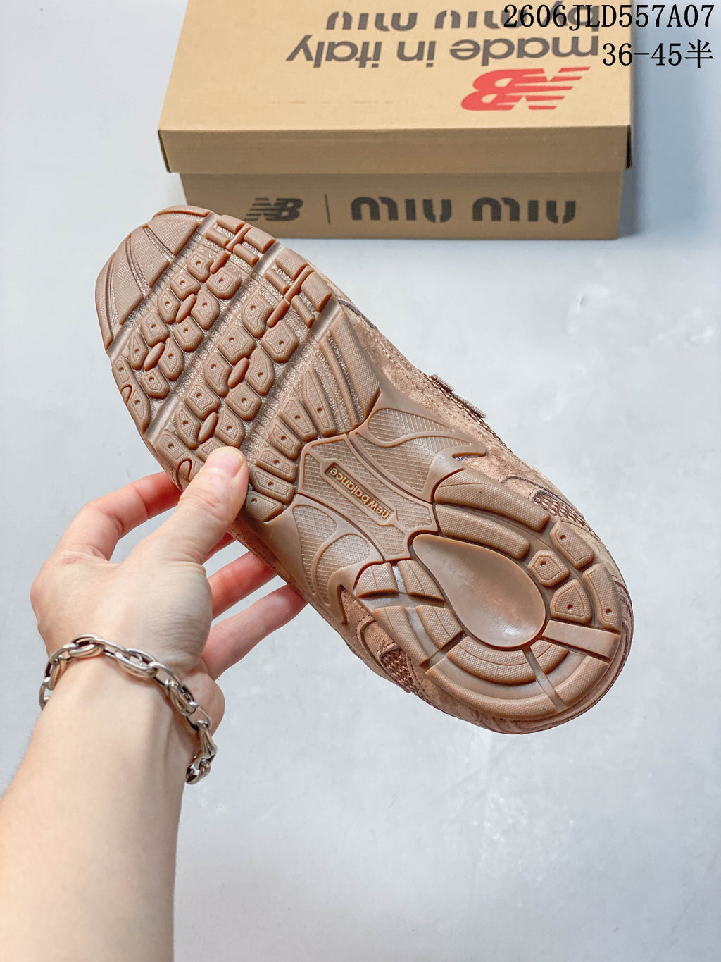 Close-up of the brown-toned sneaker outsole and tread pattern.