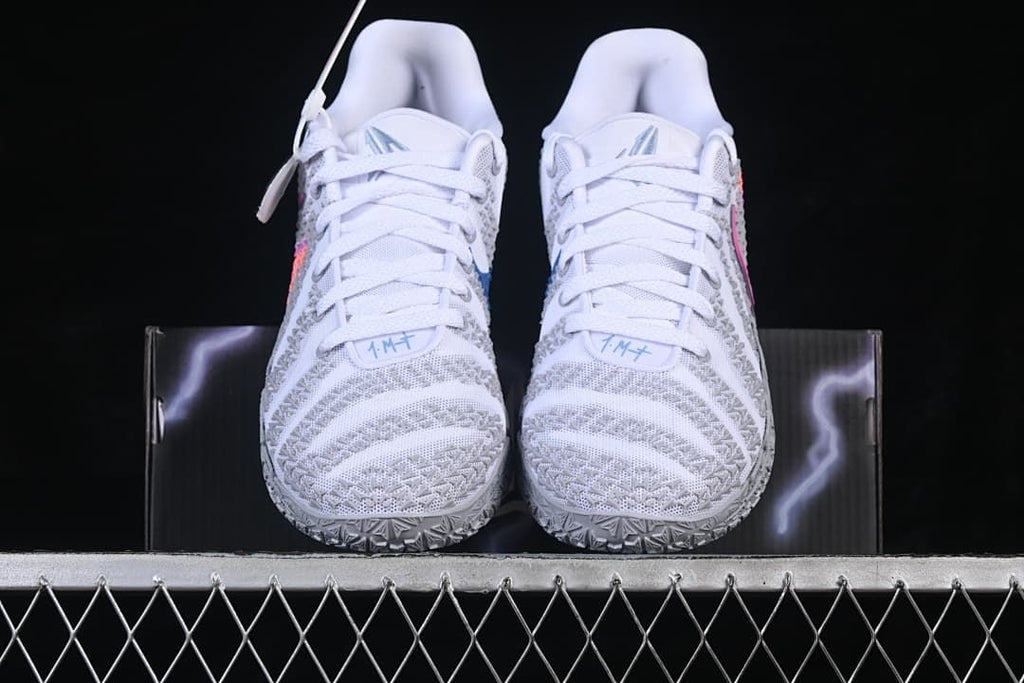 Front view of the pair showing the patterned toe boxes