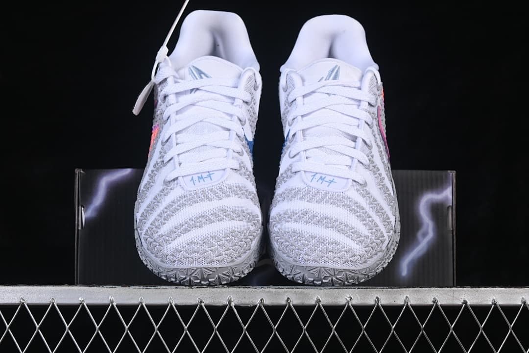 Front view of the pair showing the patterned toe boxes