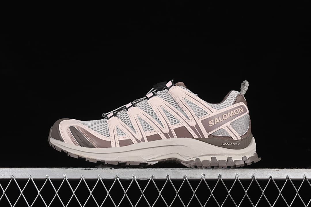Side view of a Salomon XA Pro 3D Seasonal shoe in light grey, pale pink, and taupe
