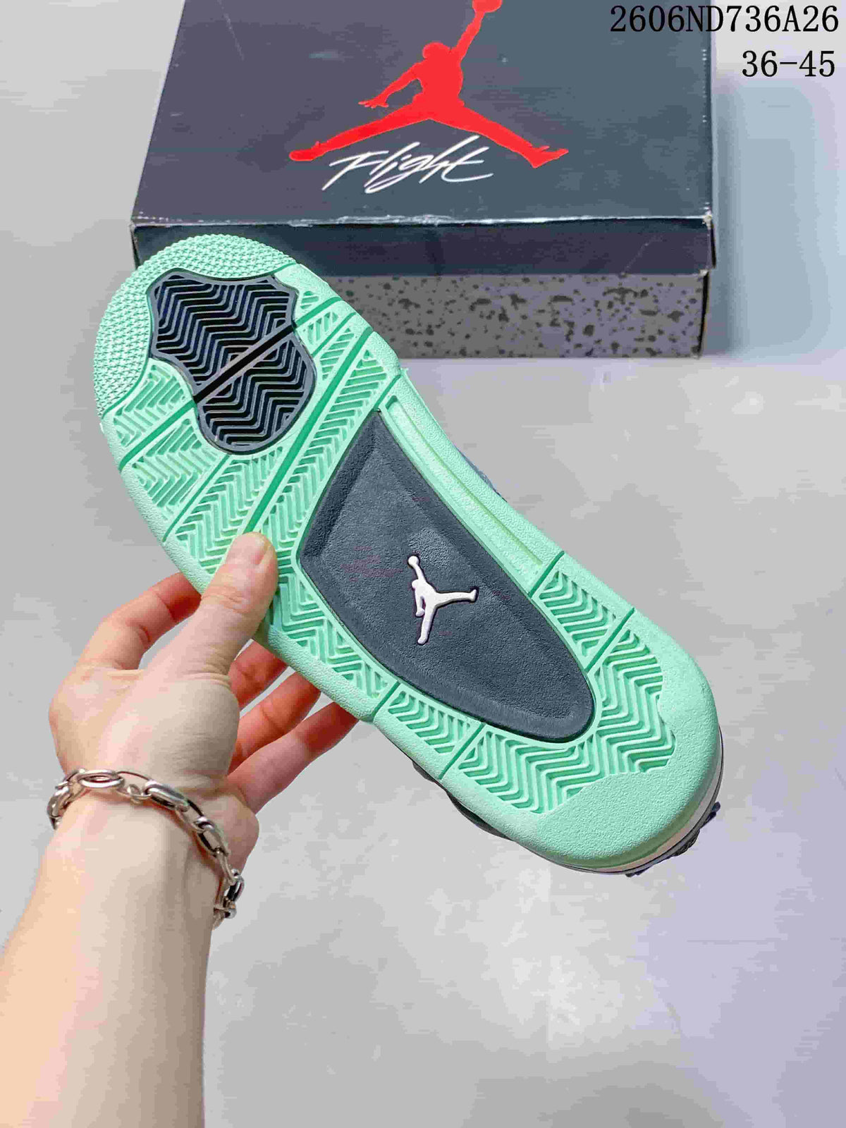 Mint-green patterned outsole of the grey Air Jordan 4 Retro sneaker
