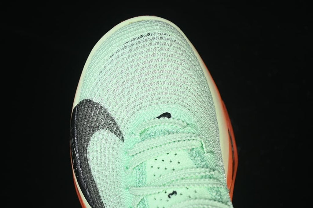 Top-down view of the perforated toe and laces