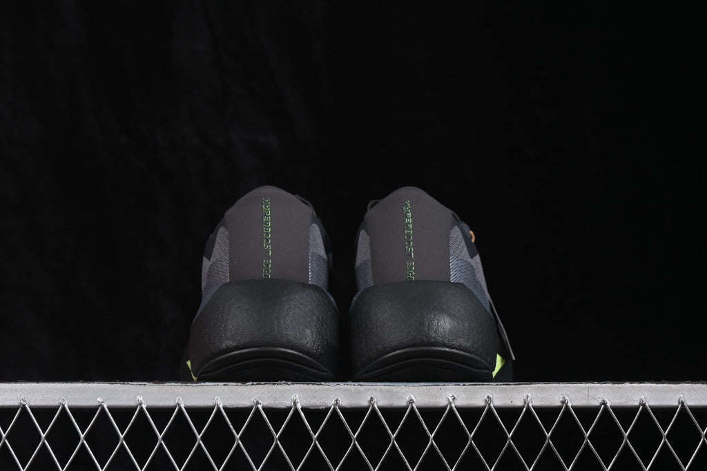 Rear view of the pair showing padded heel sections and vertical tongue or heel branding.