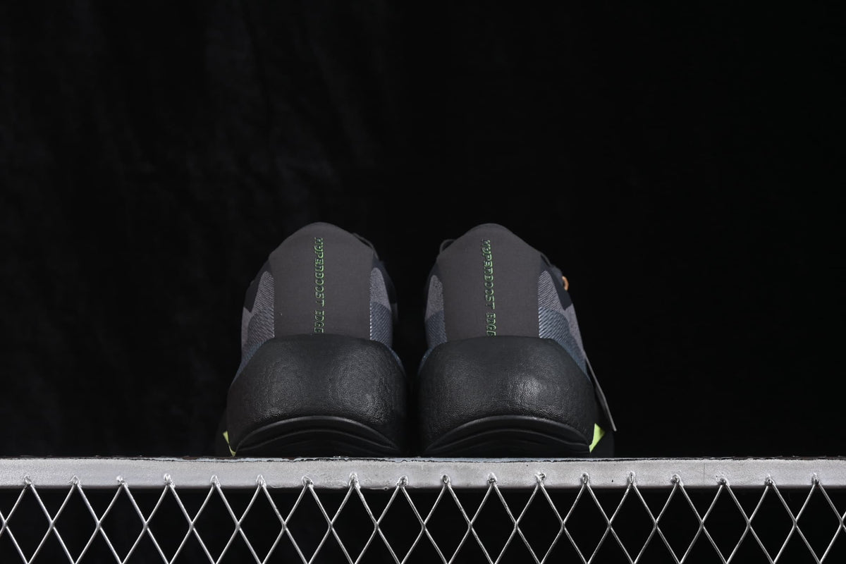 Rear view of the pair showing padded heel sections and vertical tongue or heel branding.