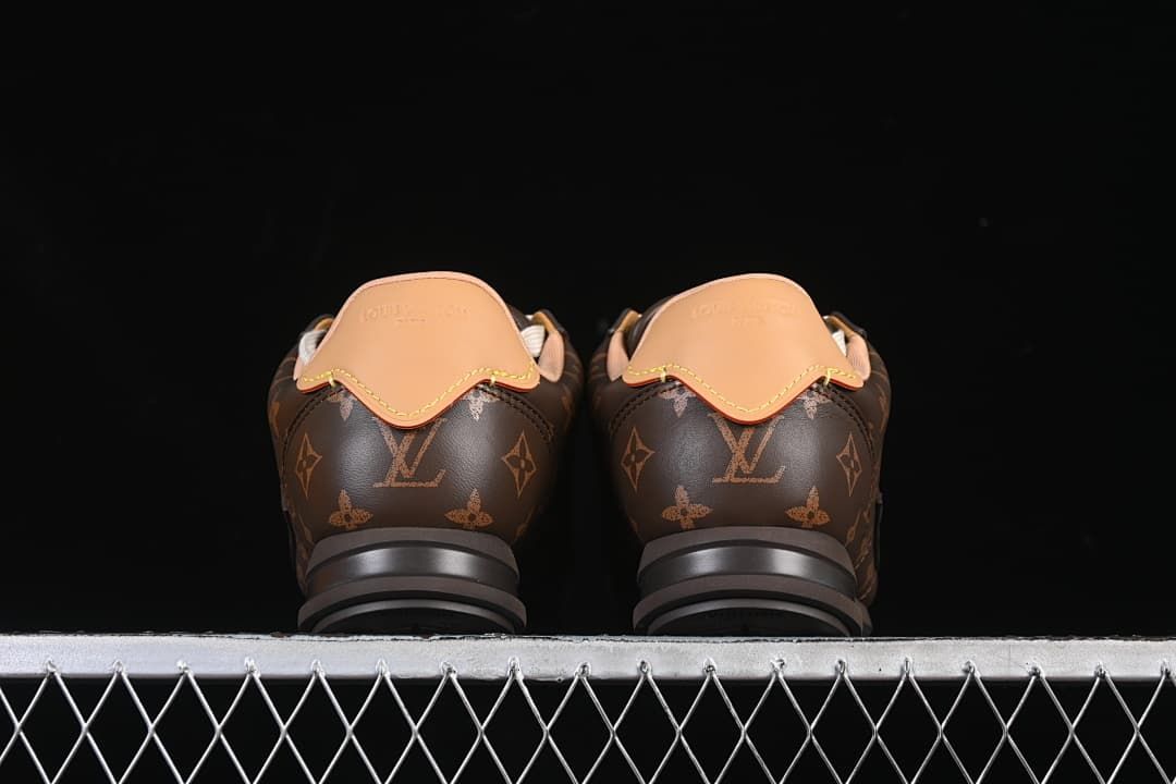 Rear view of the pair showing tan heel tabs and patterned uppers.