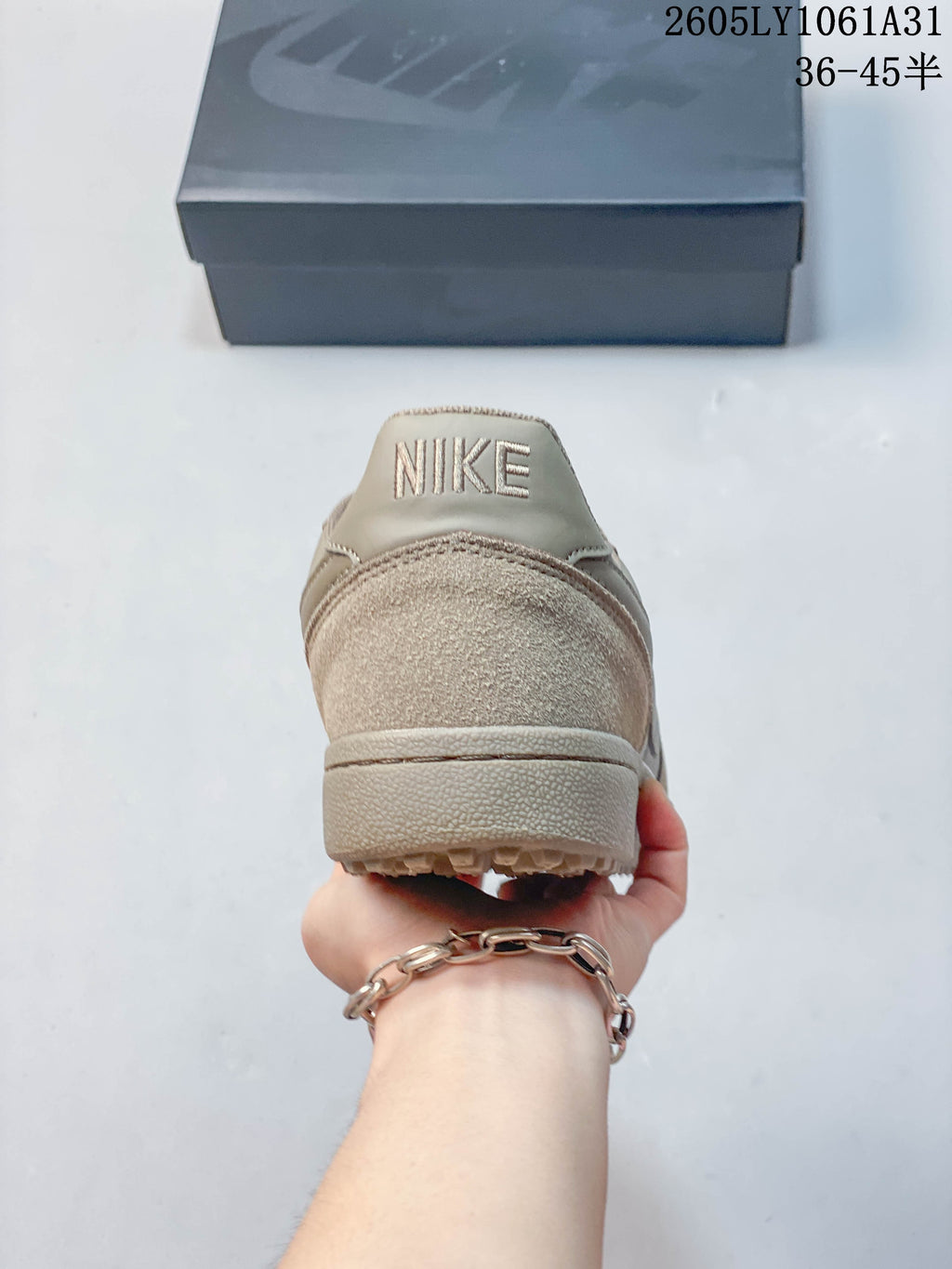 Rear view showing the heel panel and Nike lettering