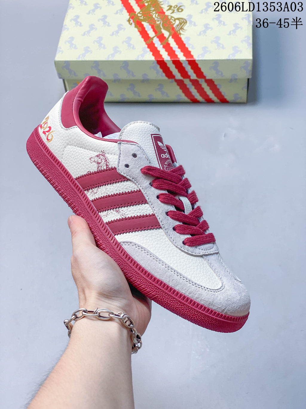 White Gazelle Indoor sneaker with burgundy stripes, matching laces, and a burgundy outsole.