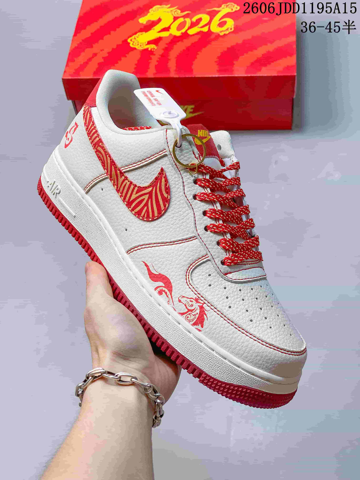 Angled side view of the white and red Nike Air Force 1 Low with patterned Swoosh and horse-inspired graphics