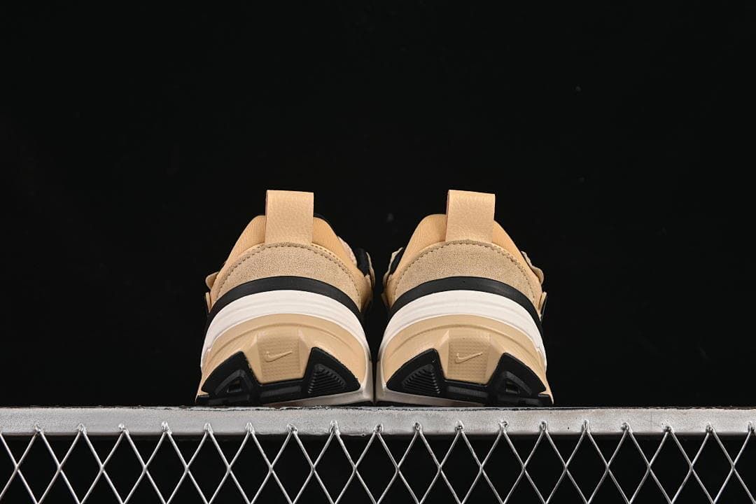 Rear view of the pair showing heel panels and outsole details