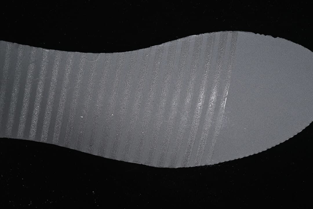 Close-up of the textured dark brown outsole.
