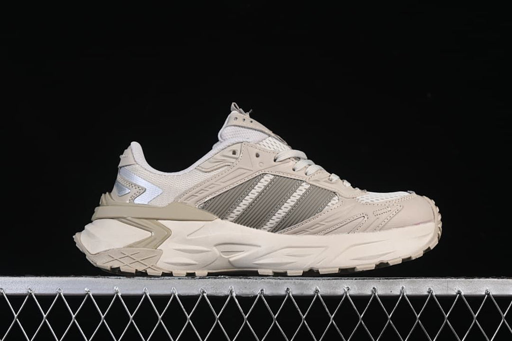 Side profile of the beige and gray XLG Storm Edge sneaker