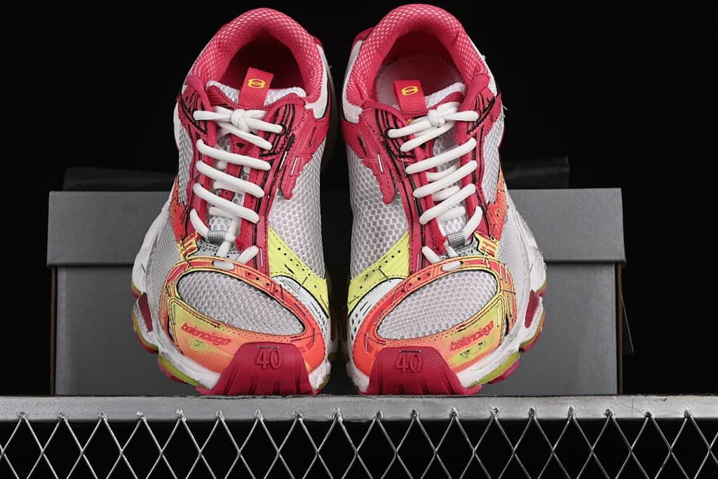 Front view of the pair showing the mesh uppers and colorful overlays