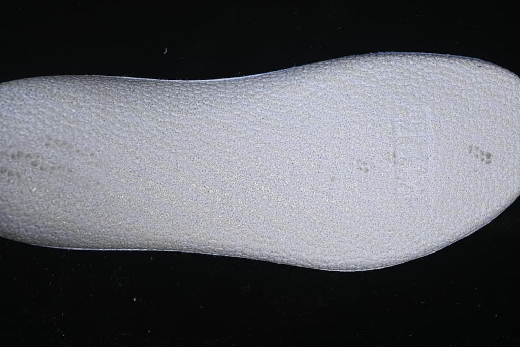 Close-up view of the textured shoe insole.