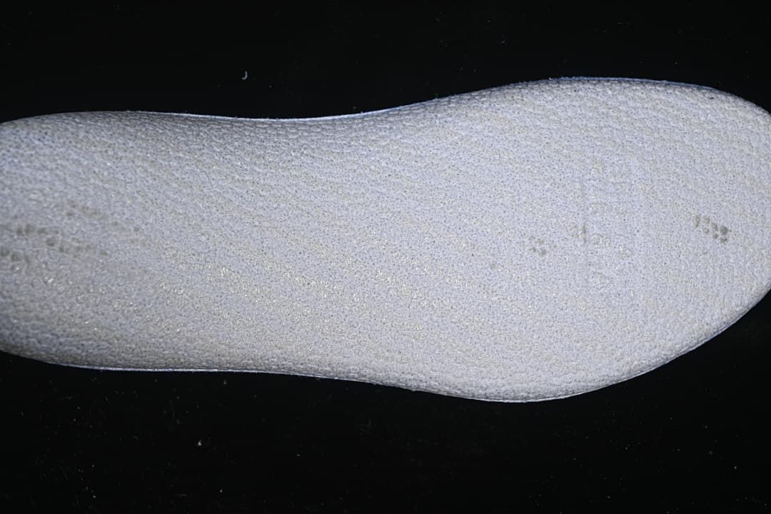 Close-up view of the textured shoe insole.