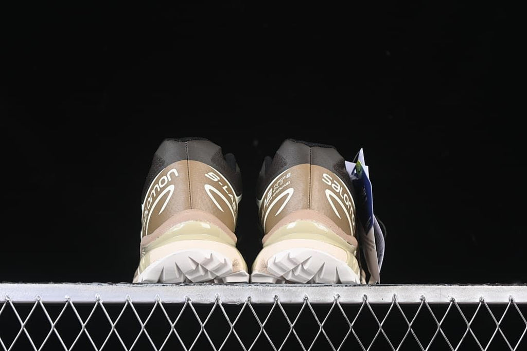 Rear view of the pair showing heel branding and outsole lugs.