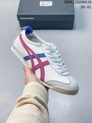 White Mexico 66 sneaker with magenta and dark blue side stripes, shown with a branded shoe box.