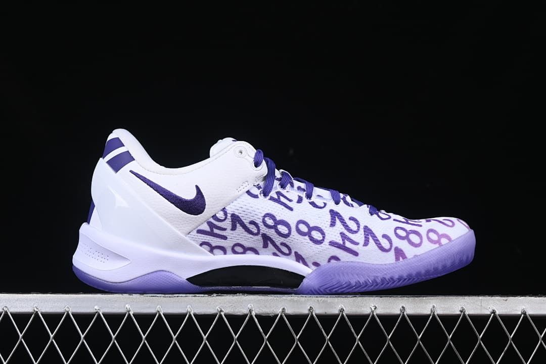 Side profile showing white and purple patterned upper