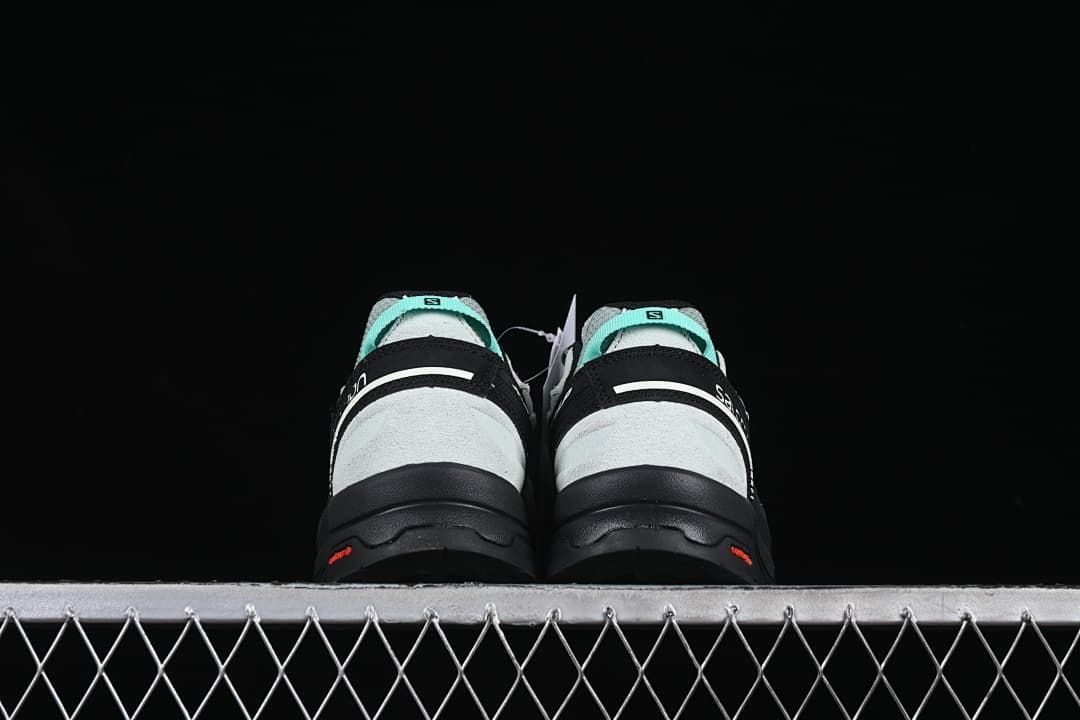 Rear view of the pair showing the heel panels and outsole.