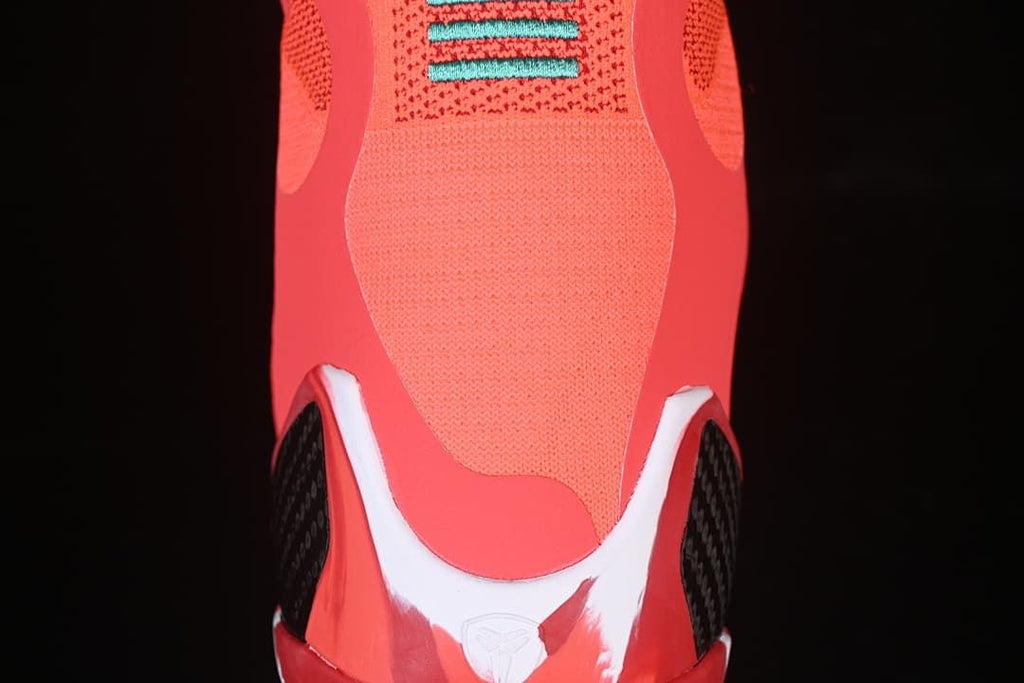 Rear view showing the high collar and heel details