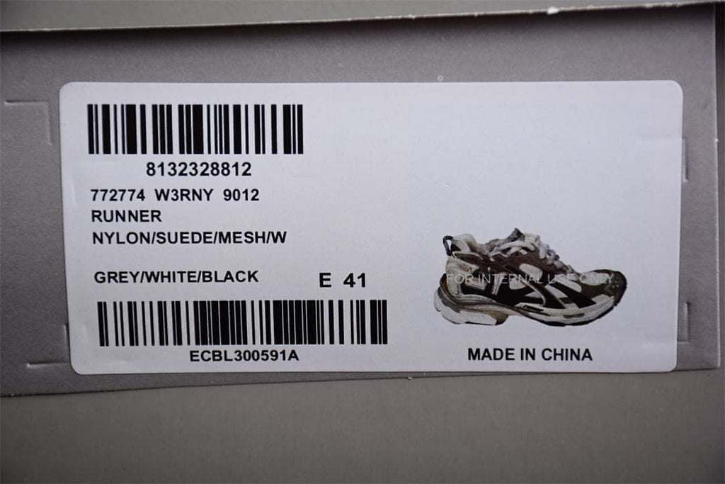 Box label showing Runner, style 772774, grey white black, and EU size 41