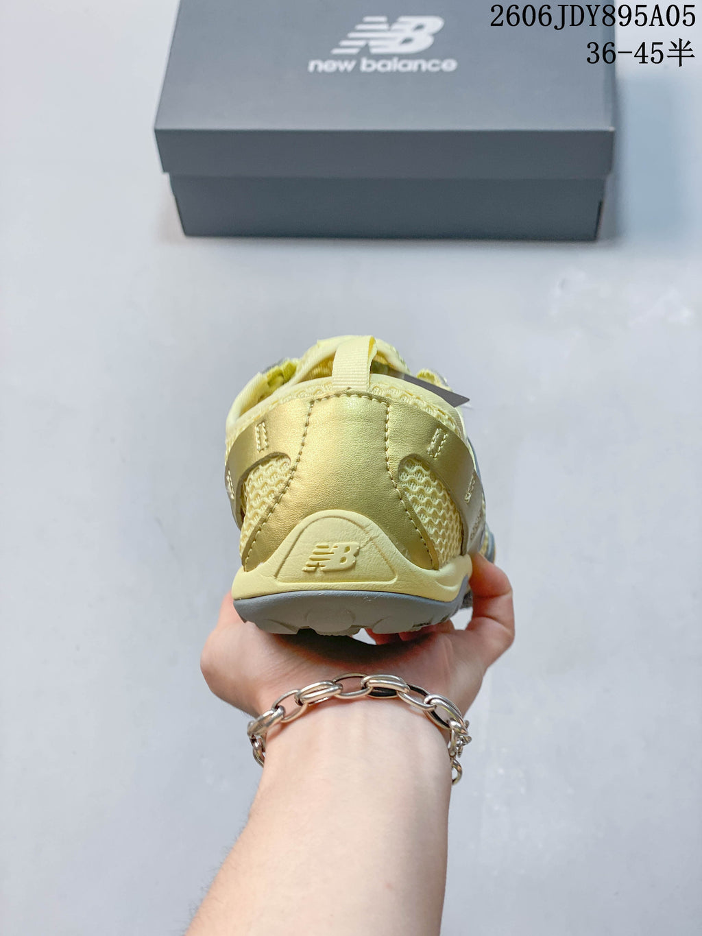 Rear view of the sneaker showing the heel and New Balance logo