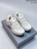 Pair of off-white and muted rose Kailas FUGA EX3 BOA hiking shoes shown on a shoe box