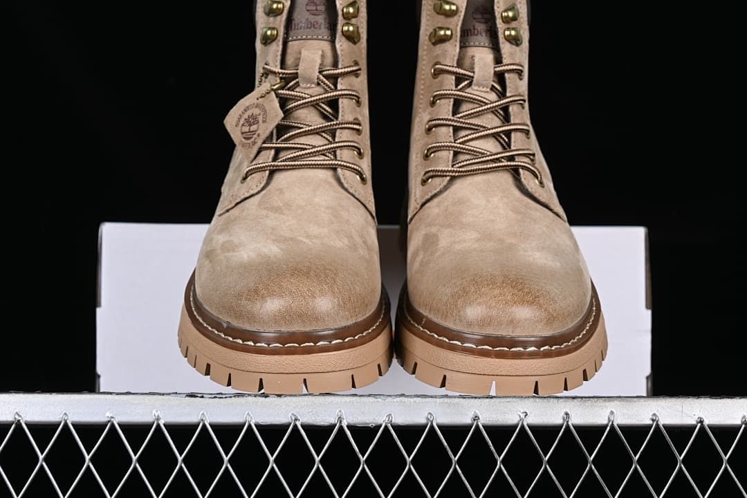 Front view of the pair showing rounded toes, laces, and chunky soles.