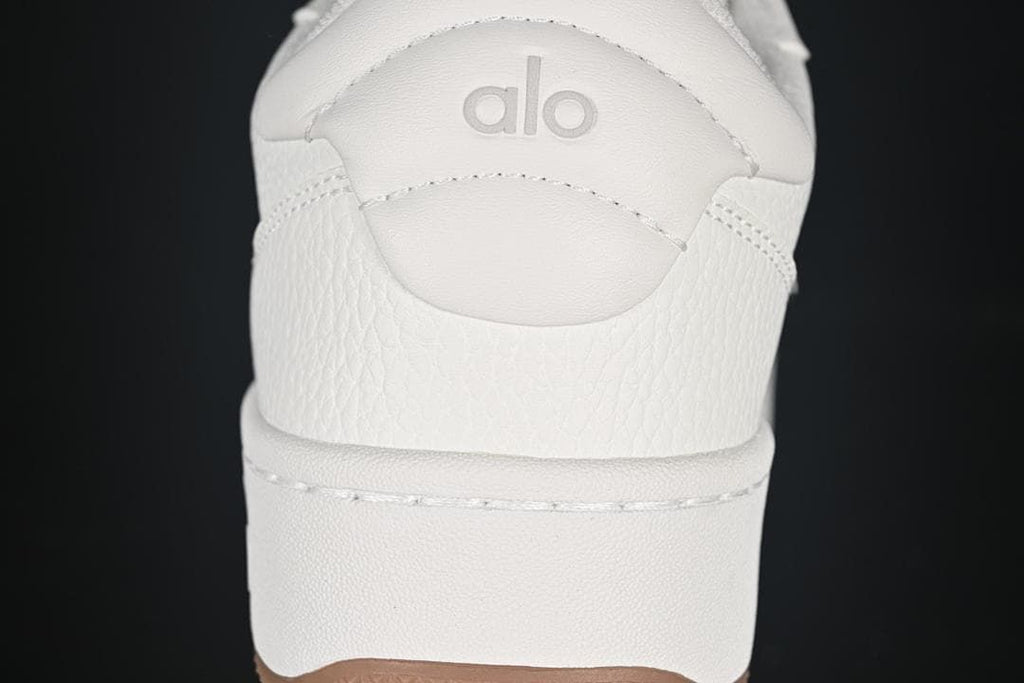 Rear view showing embossed Alo branding and gum outsole