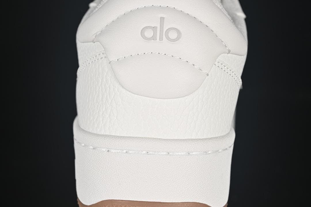 Rear view showing embossed Alo branding and gum outsole