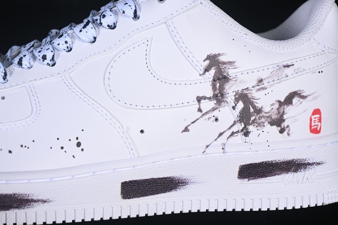 Close-up of the side graphic showing a horse illustration, red seal and speckled details