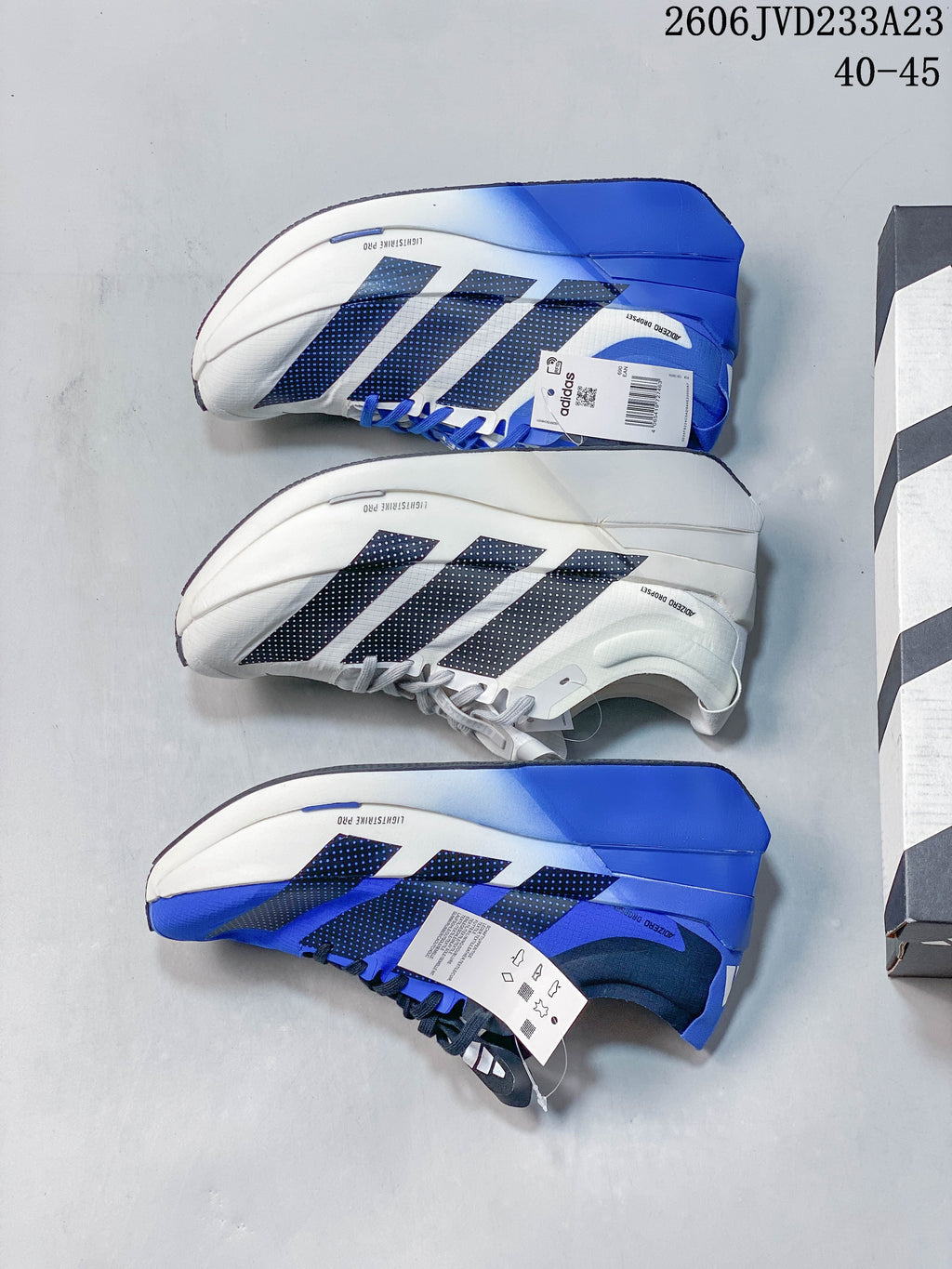 Adidas Adizero Prime X3 shoes shown in white and blue colorways from above.