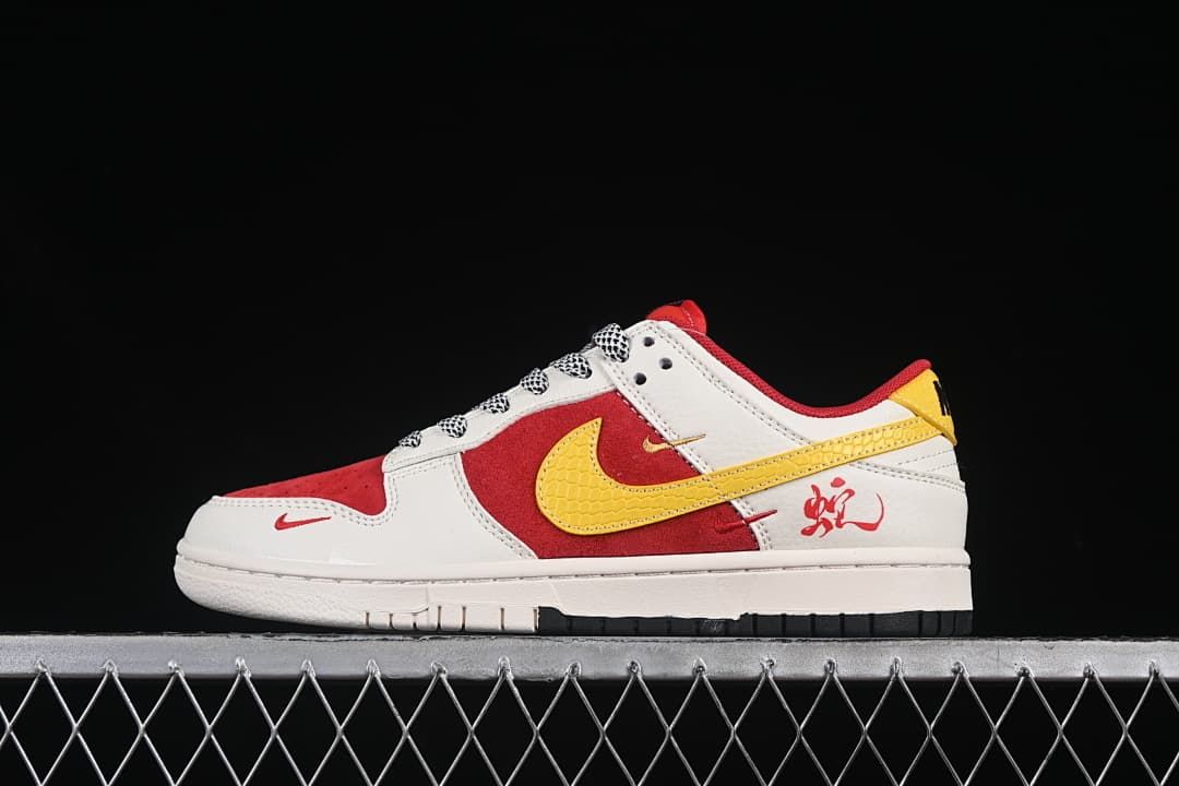 Side view of a red, white, and yellow low-top sneaker with a yellow Swoosh and heel graphic.