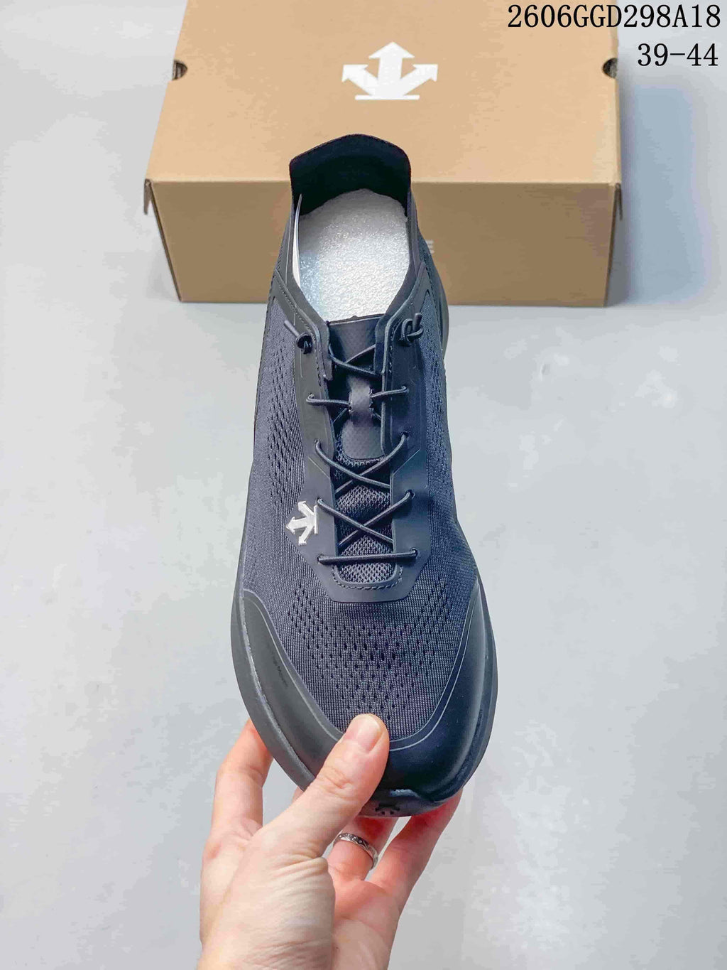 Top view of the sneaker showing its lacing and perforated toe area