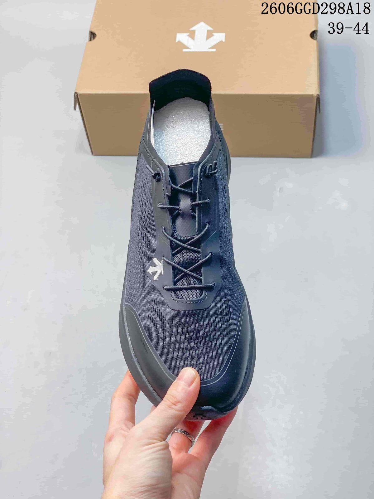 Top view of the sneaker showing its lacing and perforated toe area