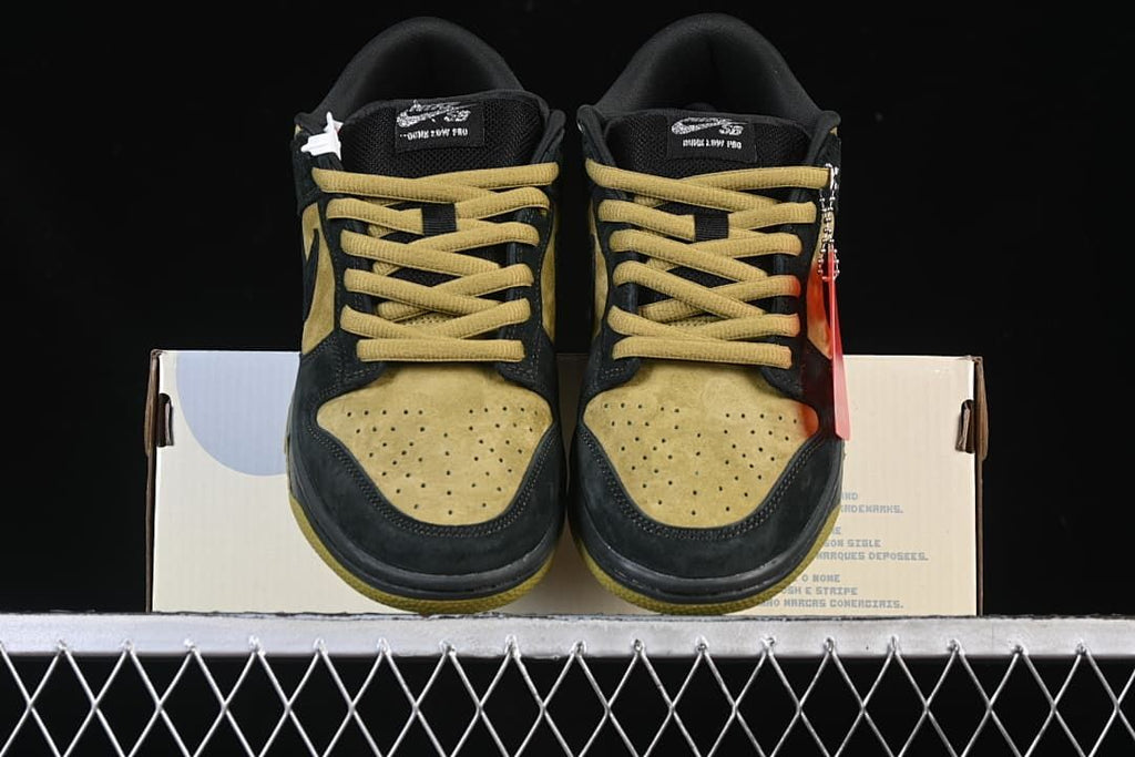 Front view of the pair with perforated toe boxes and brown-gold laces