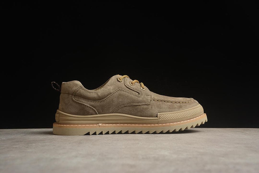 Side profile showing the low-cut shape and lugged outsole