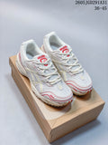 White ASICS low-top sneakers with mesh panels and red accents, shown from above on a box