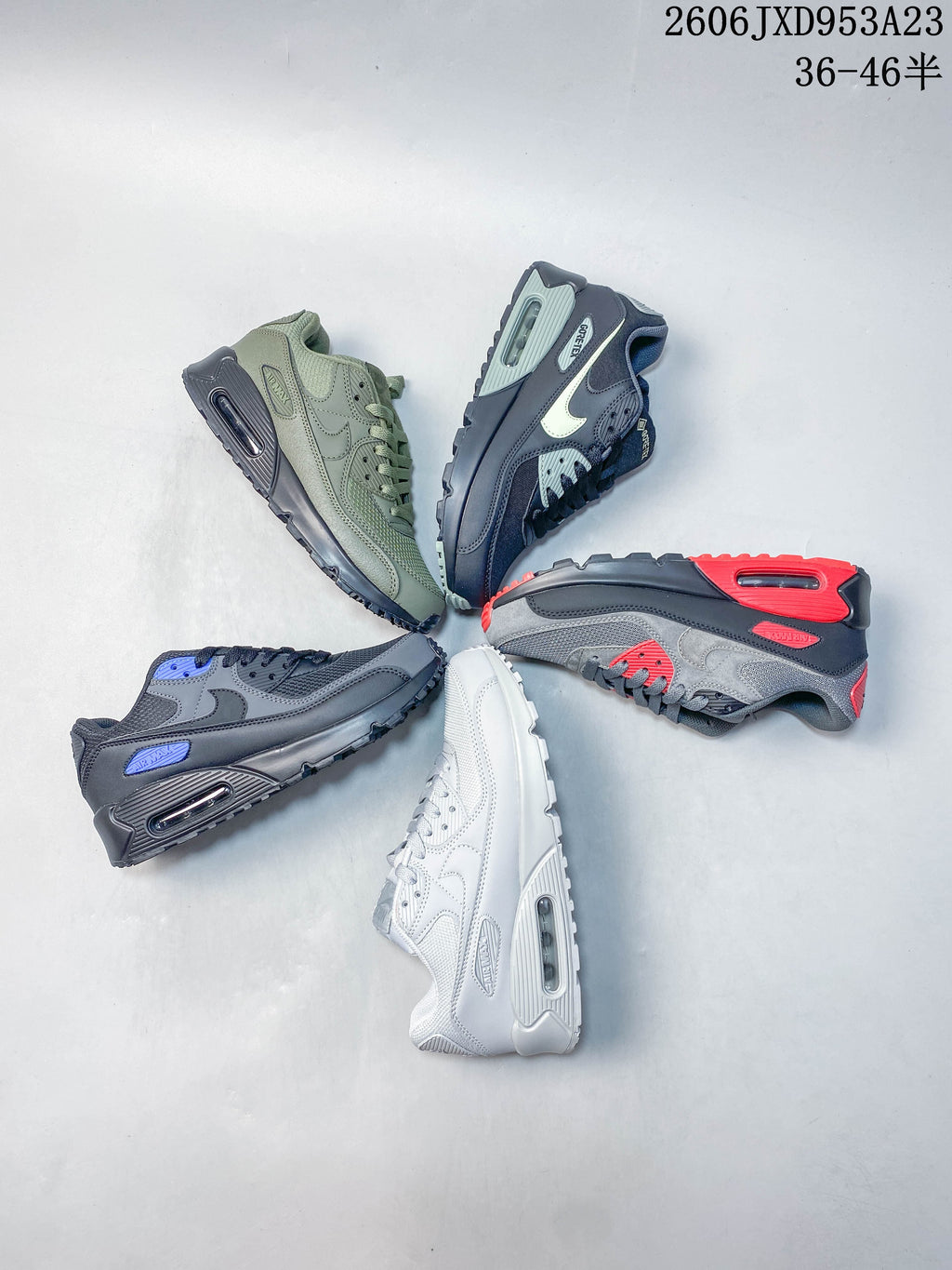 Five Nike Air Max 90 sneakers arranged in different colorways