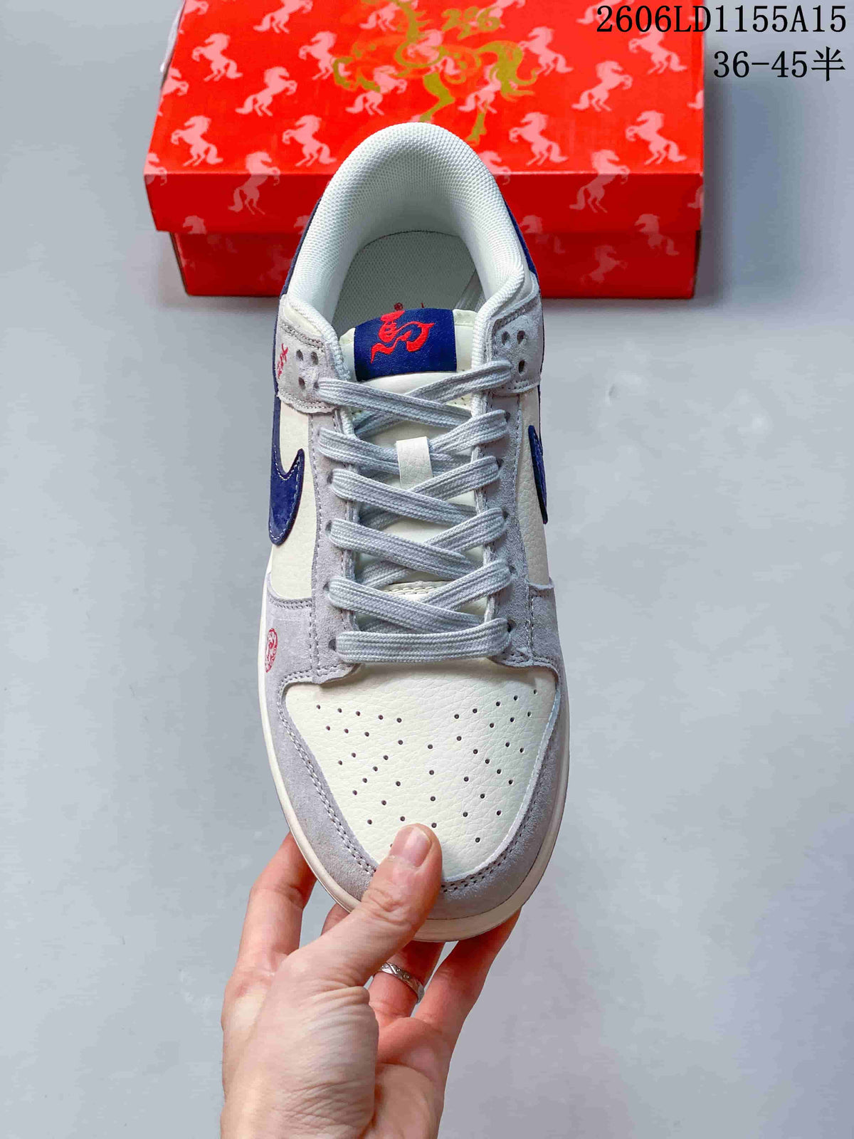 Top view showing the perforated toe, grey laces, and embroidered tongue detail
