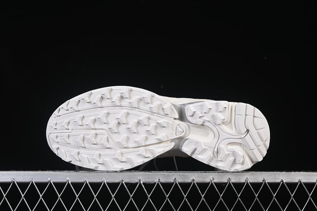 Underside view showing the lugged outsole