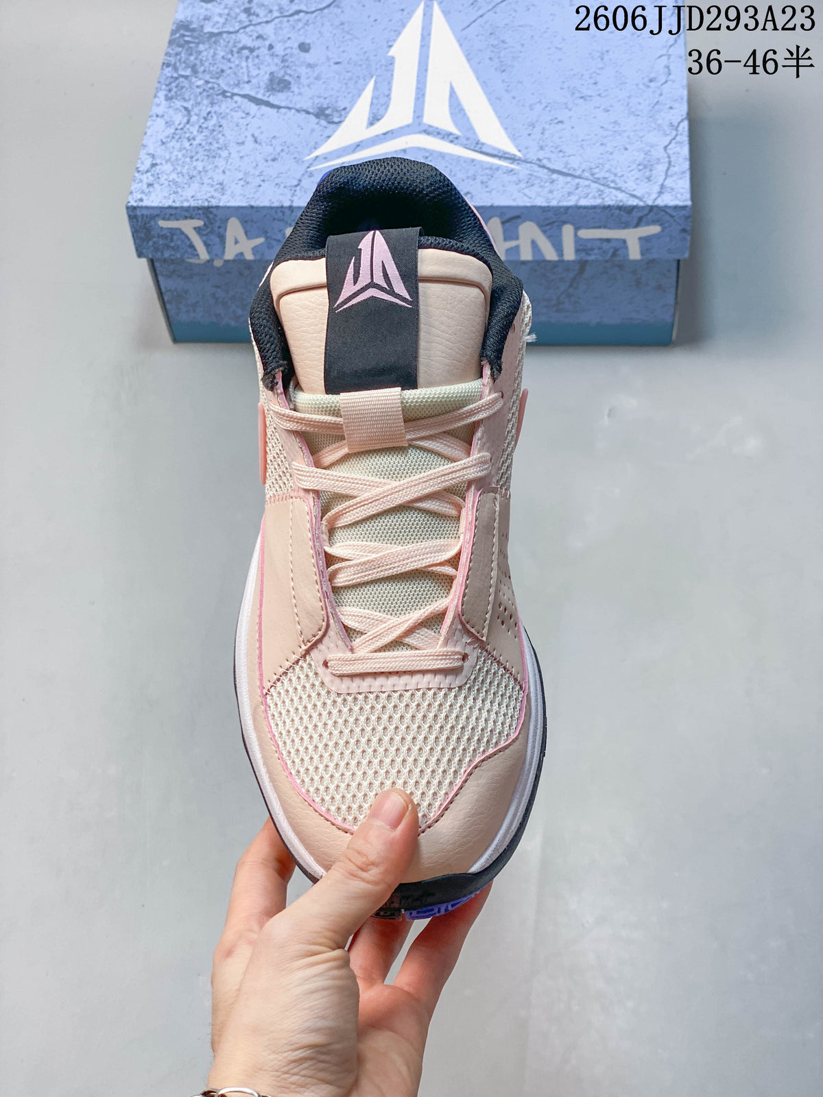 Front view of the Nike Ja 1 EP showing its laces, mesh toe, and tongue emblem.