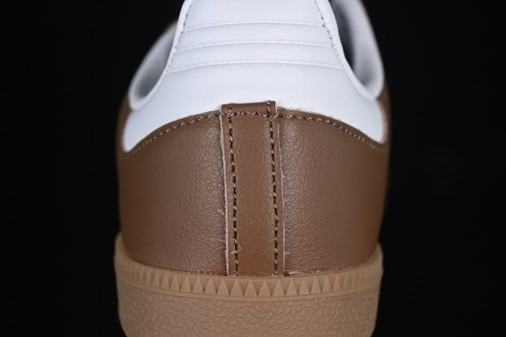 Rear detail of the brown heel panel and white collar.