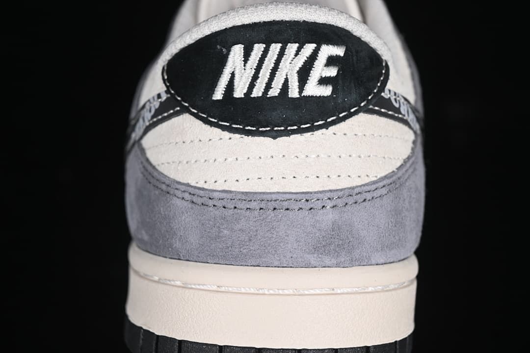 Rear view showing the heel tab and gray and cream panels