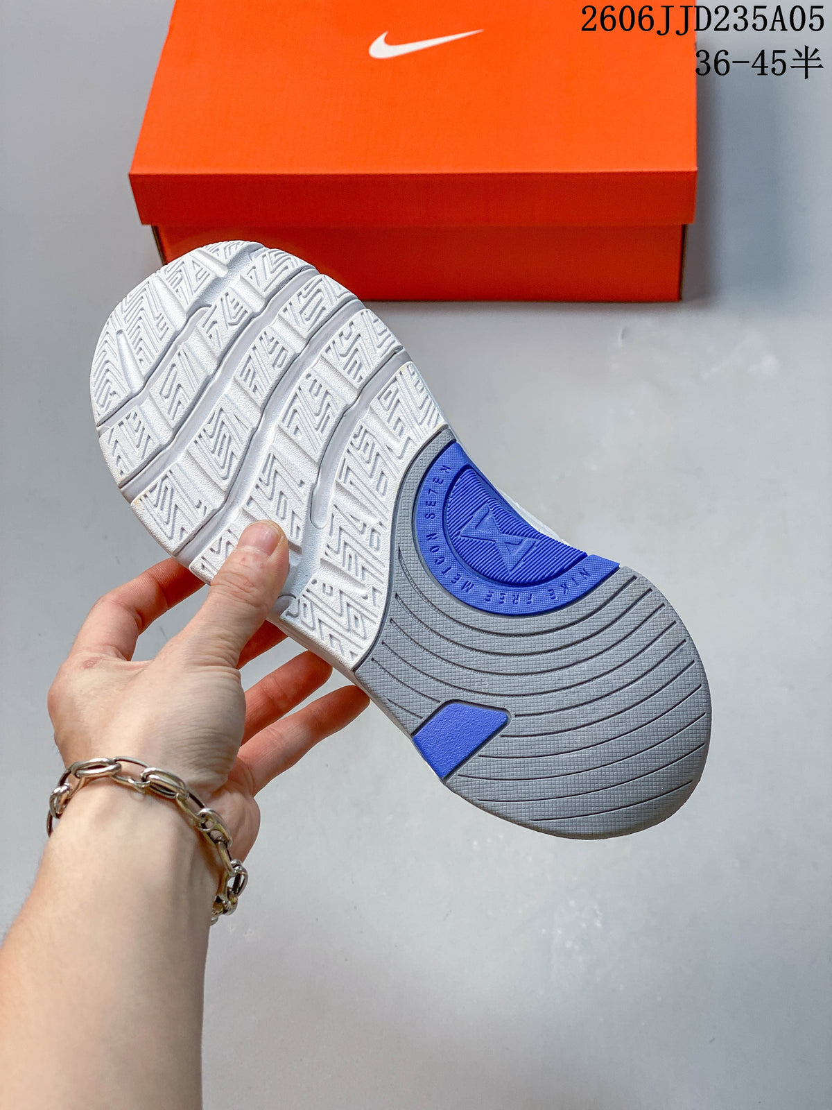 Close-up of the patterned outsole with blue and gray sections