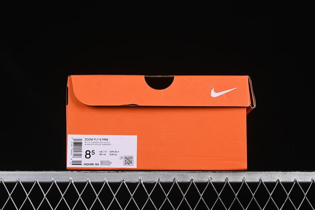 Orange Nike shoe box label identifying Zoom Fly 6 PRM and style HQ3498-100, with sample size US 8.5